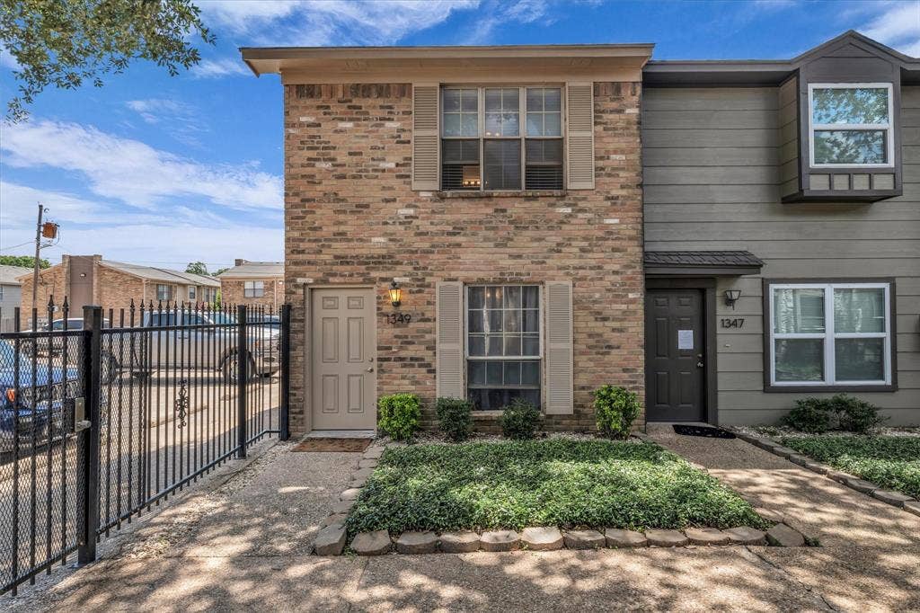 1349 S 11th Street, Waco, TX 76706 View of front of property featuring brick siding