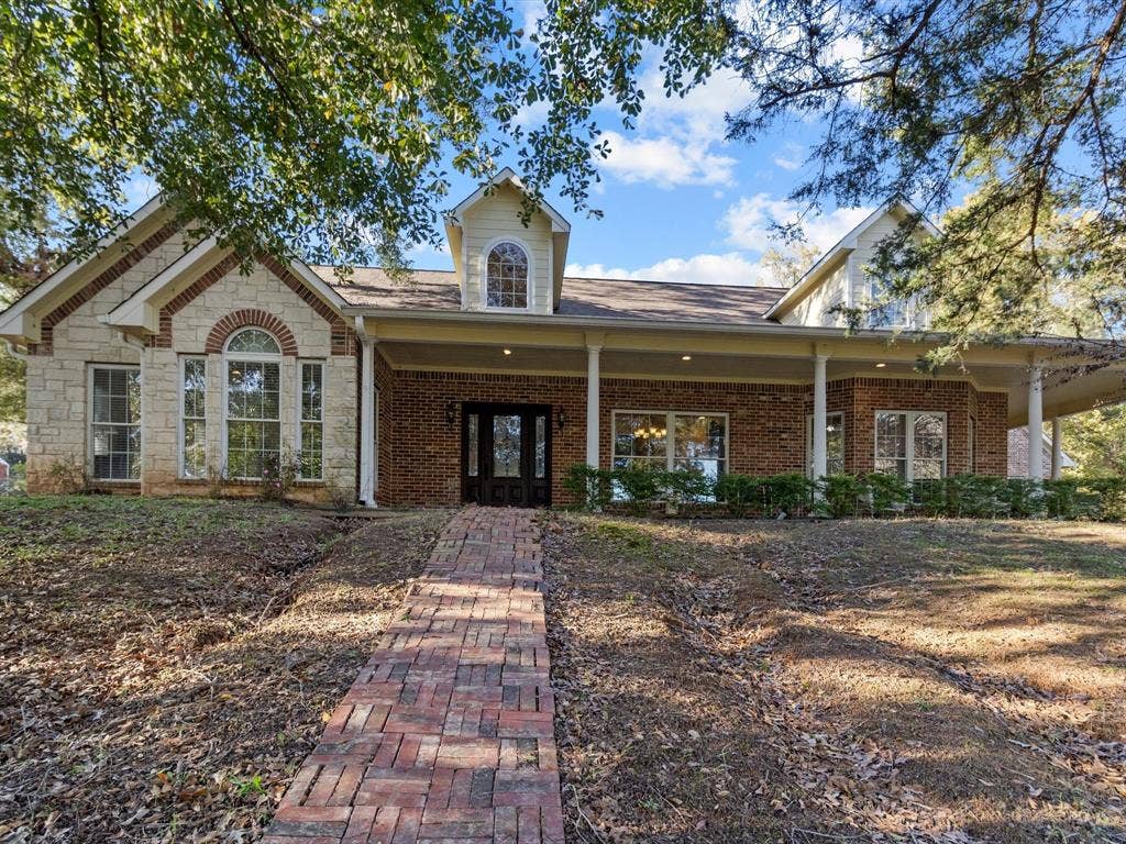 20941 Fm 16 W, Lindale, TX 75771 View of front facade featuring covered porch