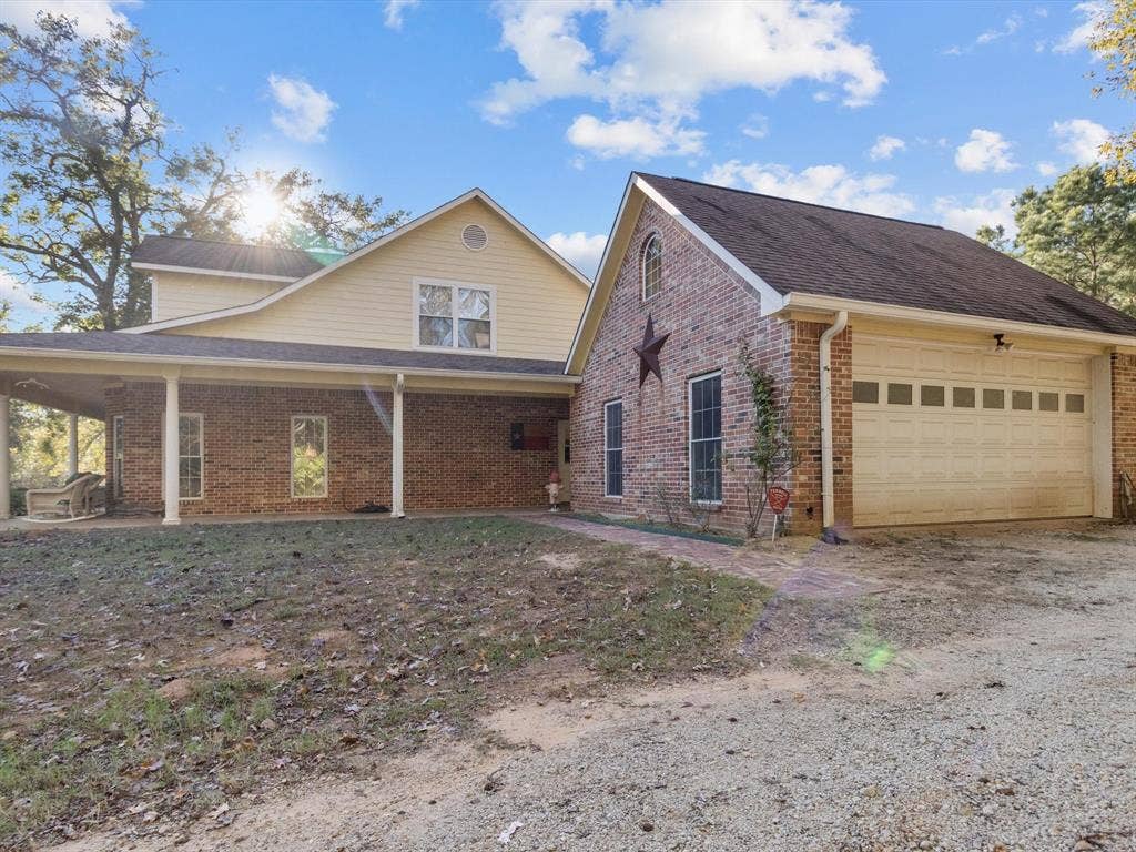 20941 Fm 16 W, Lindale, TX 75771 View of front of house with a garage and brick siding