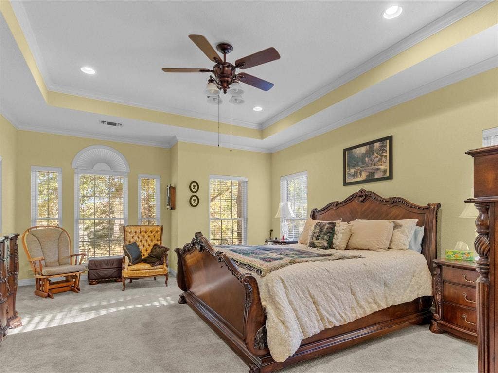 20941 Fm 16 W, Lindale, TX 75771 Carpeted bedroom with a raised ceiling, crown molding, recessed lighting, and ceiling fan