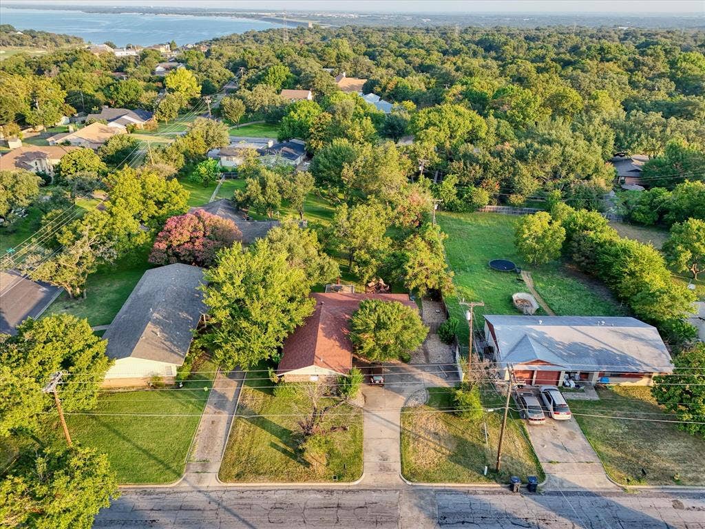 3405 Edna Avenue, Waco, TX 76708 Aerial perspective of suburban area featuring a nearby body of water