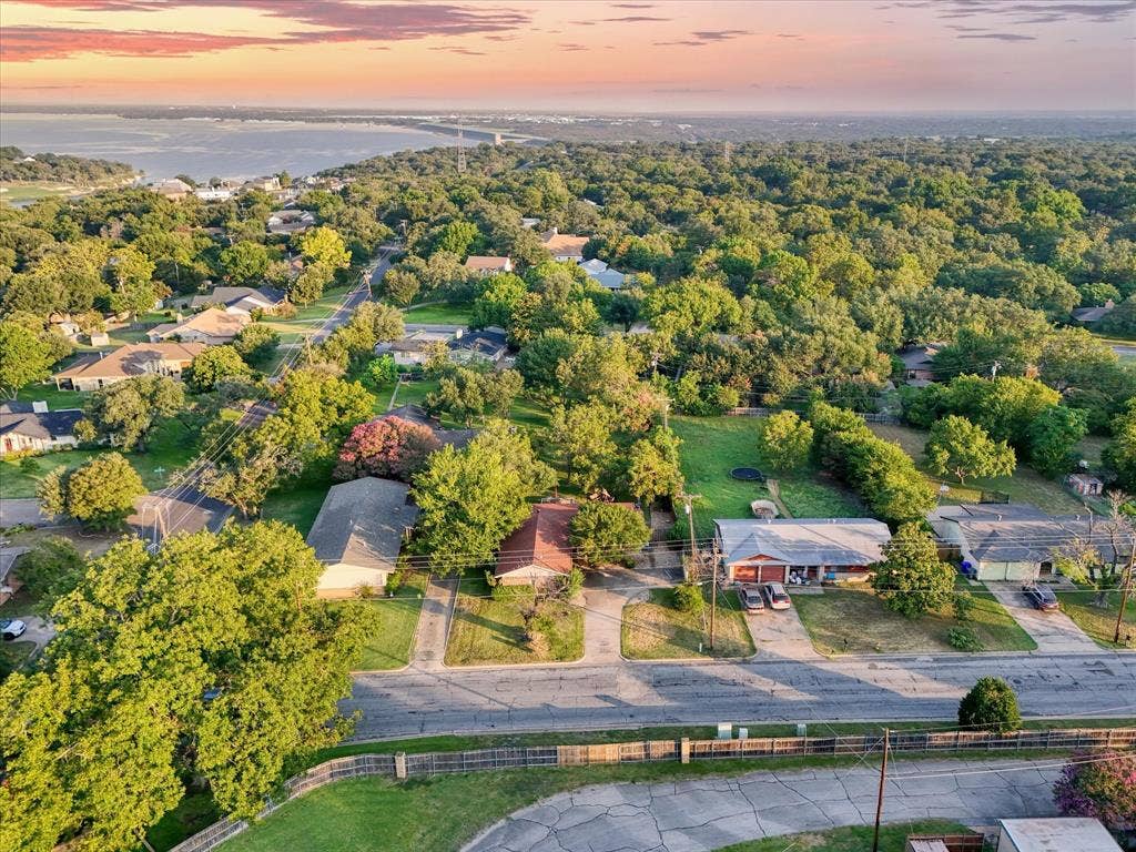 3405 Edna Avenue, Waco, TX 76708 Aerial view at dusk of a water view and a residential view