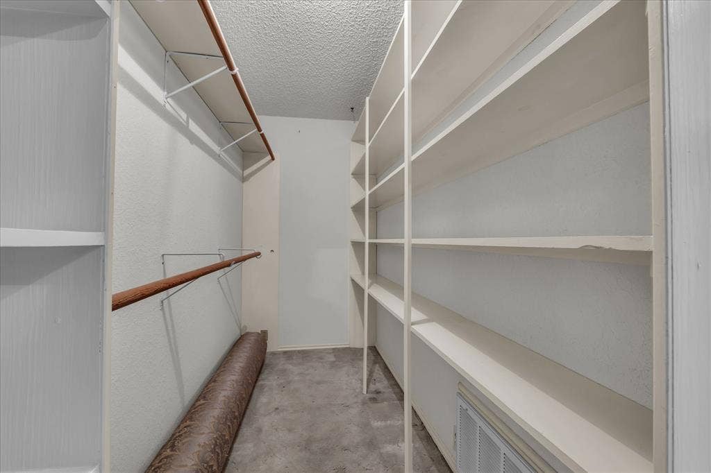 3405 Edna Avenue, Waco, TX 76708 Walk in closet featuring light colored carpet