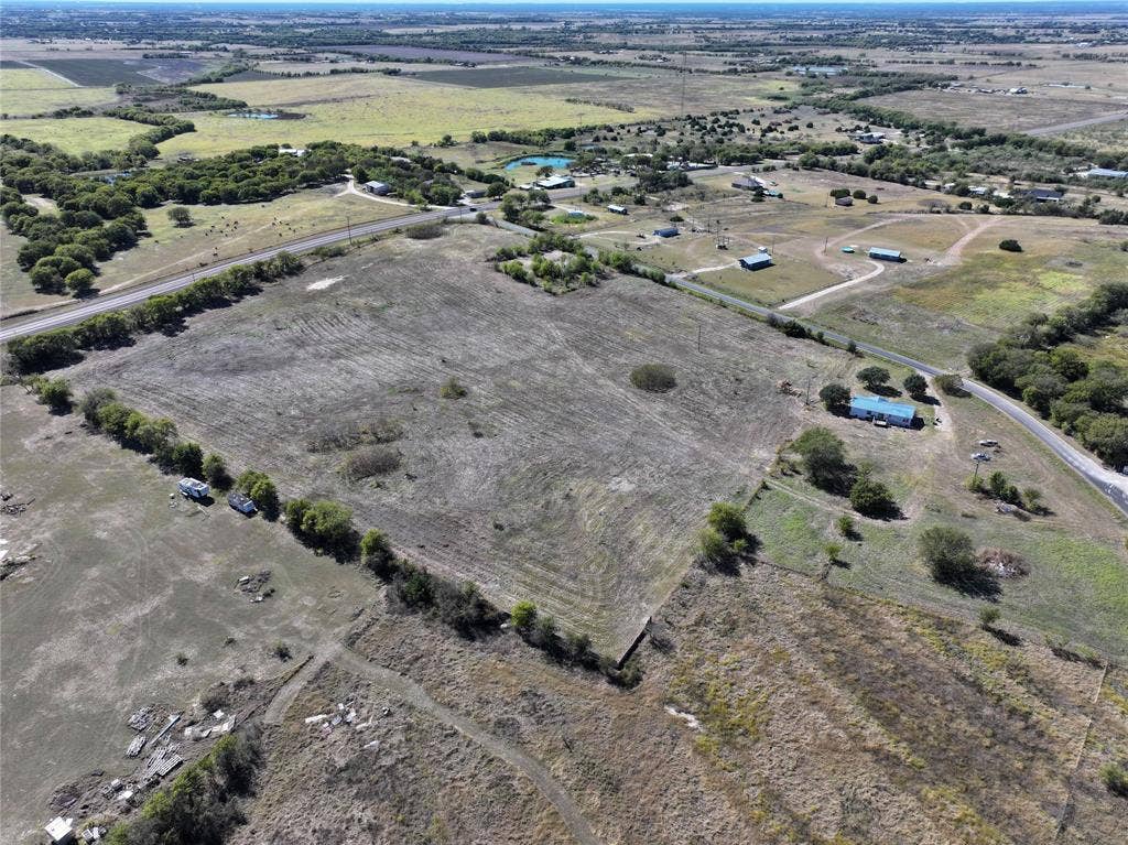 Aerial overview of property's location with rural landscape