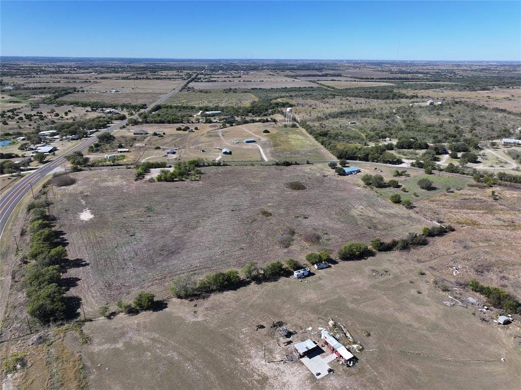 Aerial view of property's location featuring rural landscape