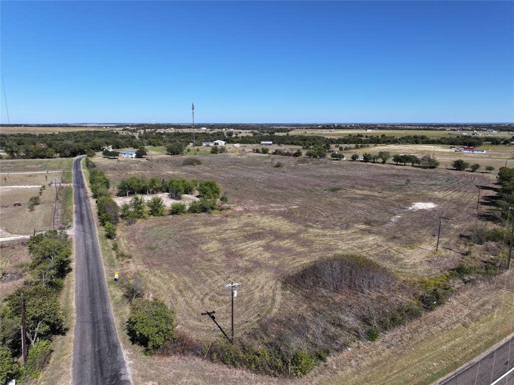Aerial overview of property's location with rural landscape