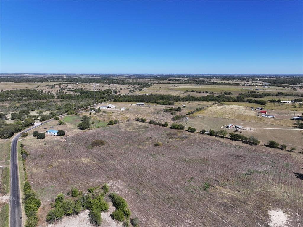 Aerial overview of property's location with rural landscape