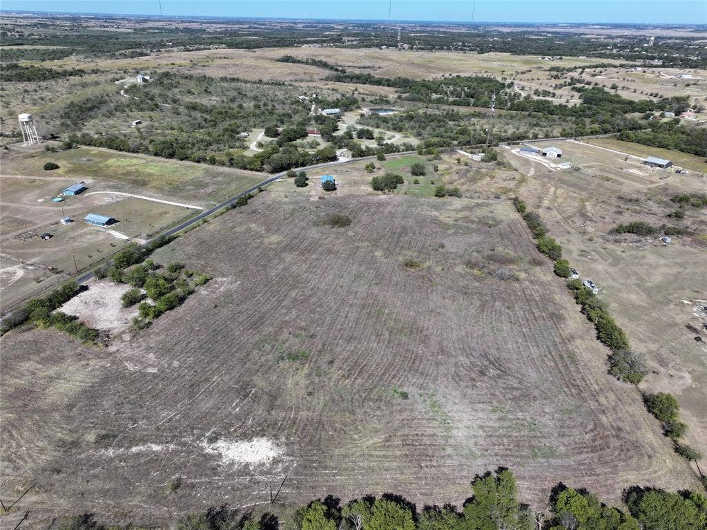 Aerial overview of property's location with rural landscape