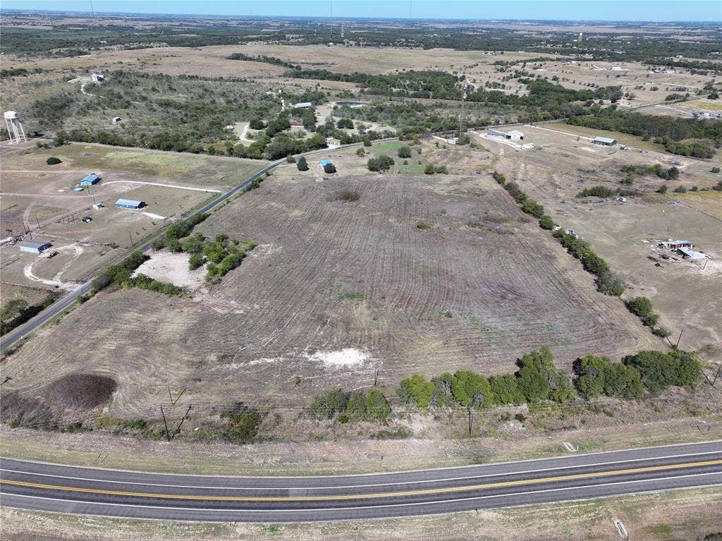 View of property location featuring rural landscape and farmland