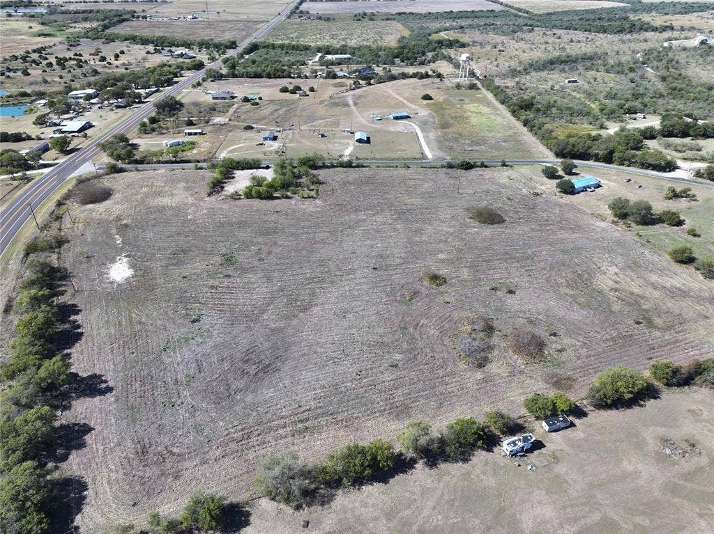 Aerial view of property's location with rural landscape