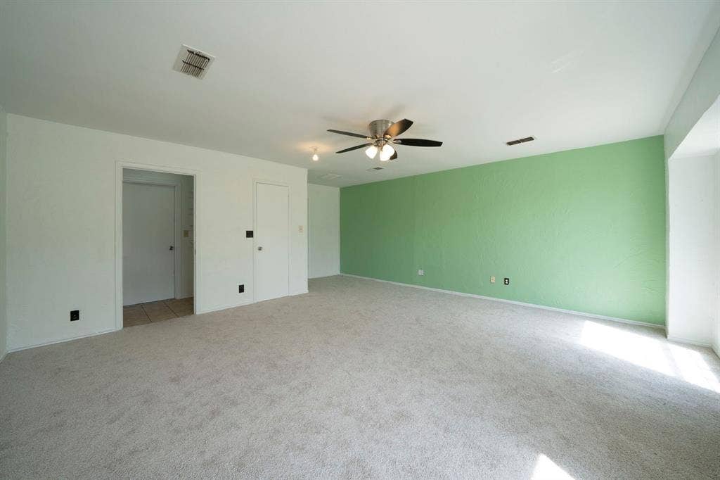 105 Briar Lane, Waxahachie, TX 75165 Unfurnished bedroom featuring light colored carpet and ceiling fan