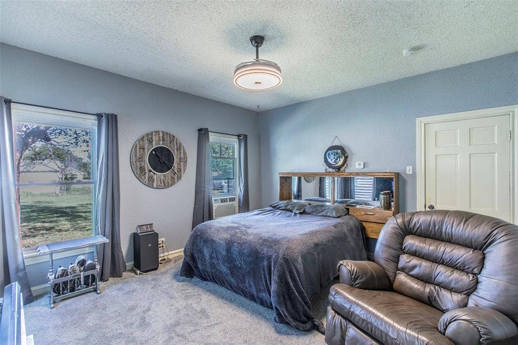 2603 Pine Avenue, Waco, TX 76708 Bedroom with a textured ceiling and carpet