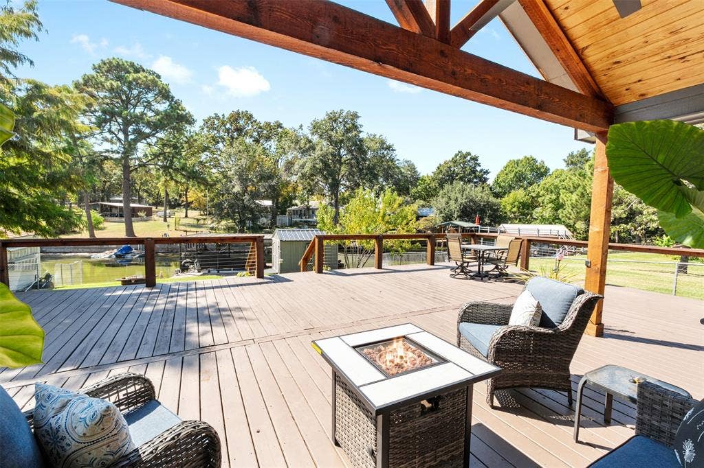 127 Rueda Encina Street, Gun Barrel City, TX 75156 Large deck for all the friends and family to enjoy.