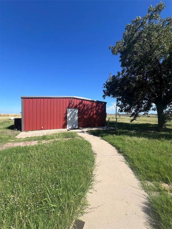 4038 State Highway 351, Abilene, TX 79601 Surrounding community with a pole building, an outbuilding, and a yard