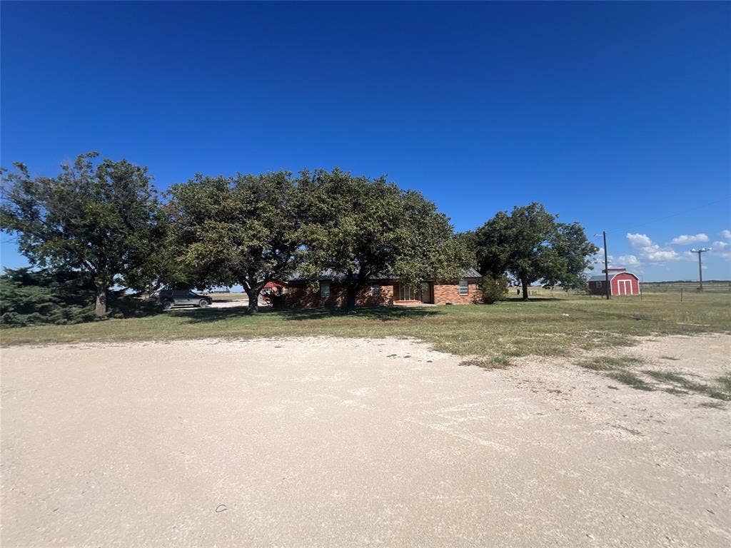 4038 State Highway 351, Abilene, TX 79601 View of yard featuring a storage shed