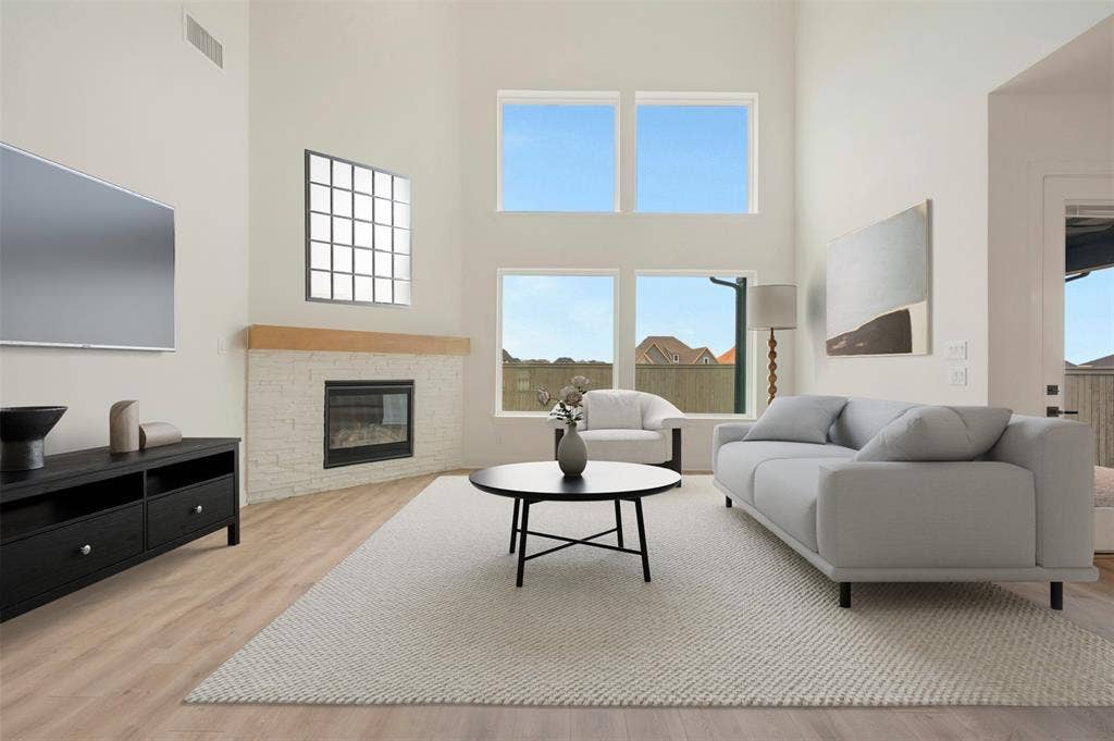 Vaulted ceilings with abundant natural light from stacked windows