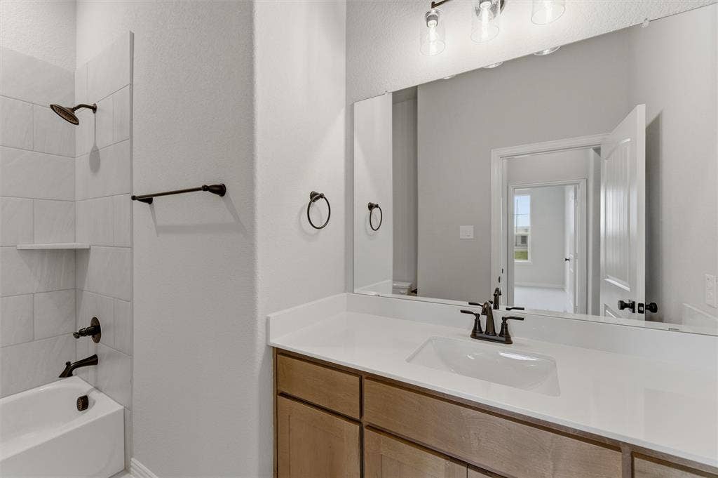 9007 County Road 623, Blue Ridge, TX 75424 Full bathroom featuring vanity and bathing tub / shower combination