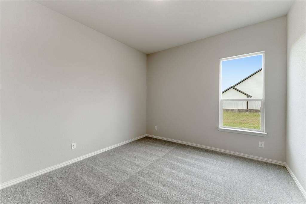 9007 County Road 623, Blue Ridge, TX 75424 Unfurnished room with light carpet and baseboards