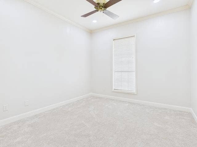 1178 E Oval Drive, Athens, TX 75751 Empty room featuring crown molding, light colored carpet, a ceiling fan, and recessed lighting