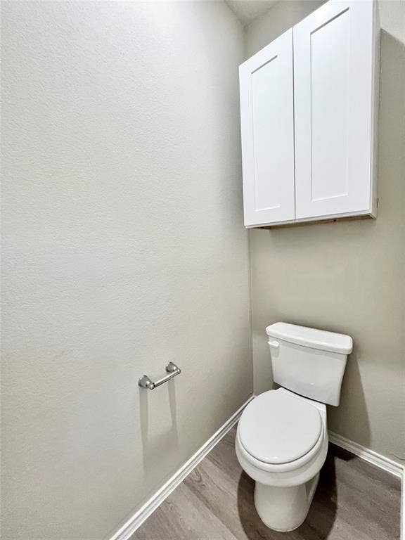 3501 E Renfro Street, #106, Burleson, TX 76028 Primary Bathroom with wood finished floors and baseboards