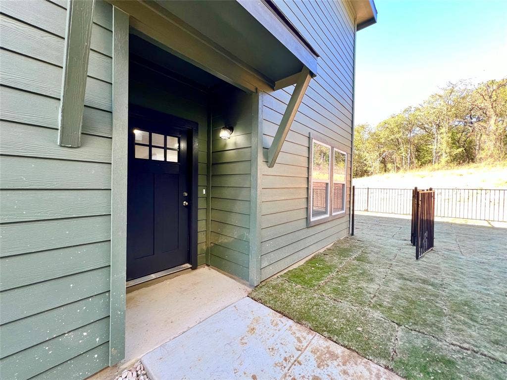 3501 E Renfro Street, #106, Burleson, TX 76028 Entrance to property with a patio area