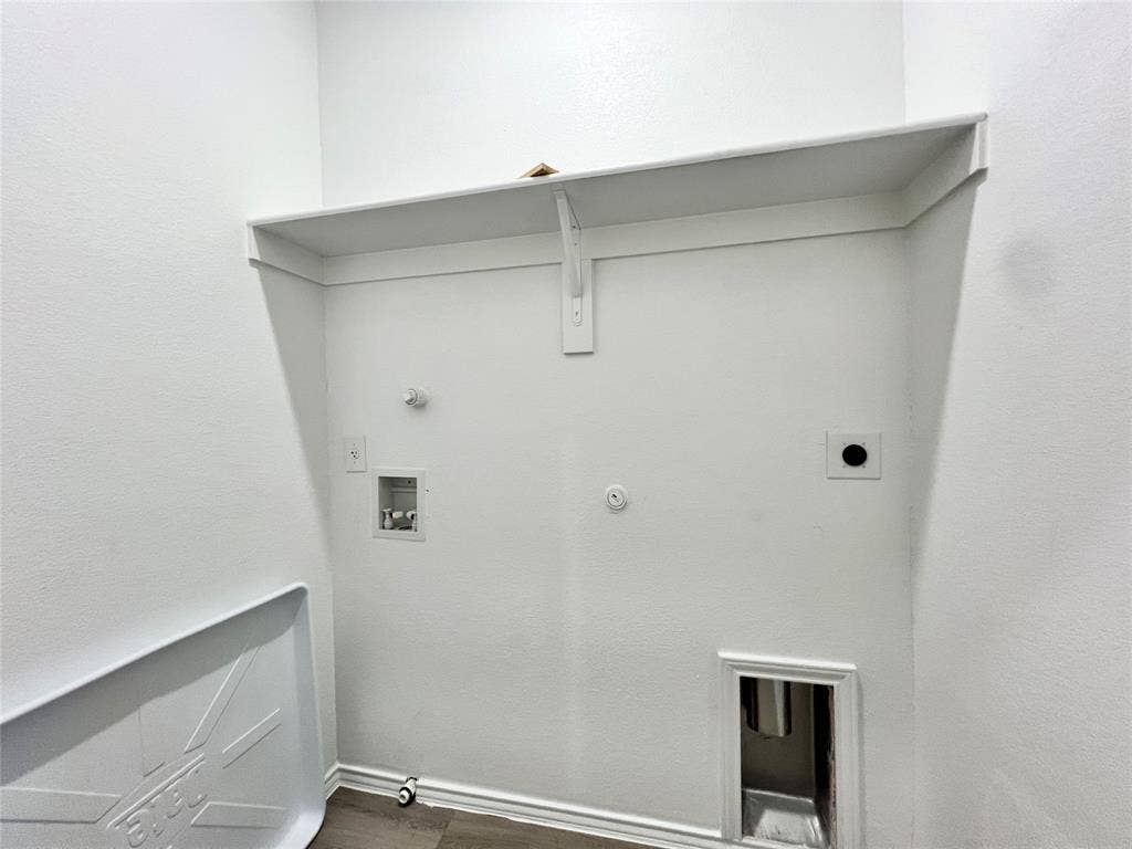 3501 E Renfro Street, #106, Burleson, TX 76028 Washroom featuring hookup for washer and dryer