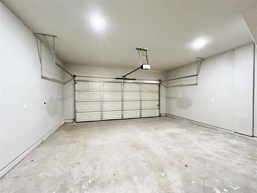 3501 E Renfro Street, #106, Burleson, TX 76028 View of garage