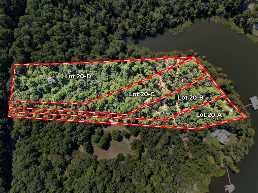 Lot 20-C Eastside Road, Tyler, TX 75707 Aerial view of property and surrounding area featuring property parcel outlined and a large body of water