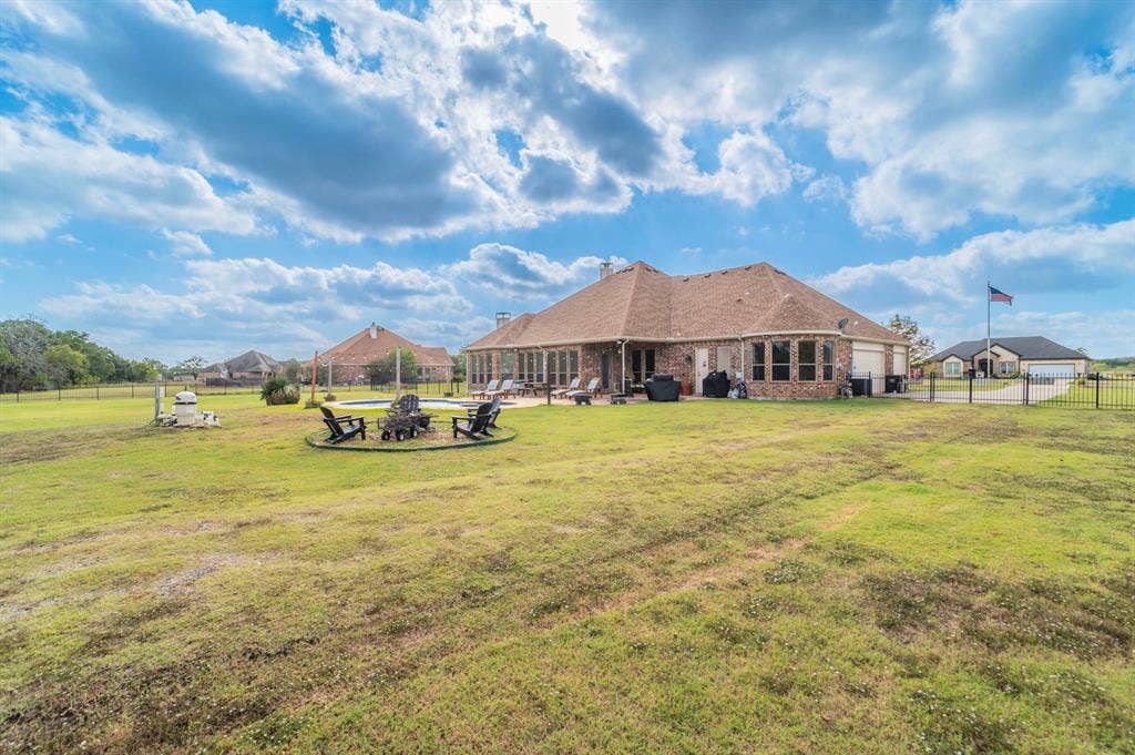 5229 Horseshoe Lane, Royse City, TX 75189 View of yard with a patio area and an outdoor fire pit