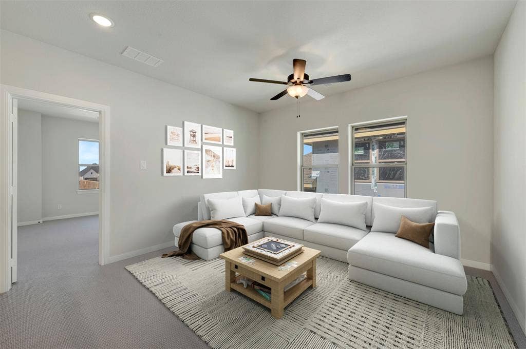 3752 Bermuda Grass Way, Grand Prairie, TX 76084 Carpeted living area with ceiling fan and recessed lighting