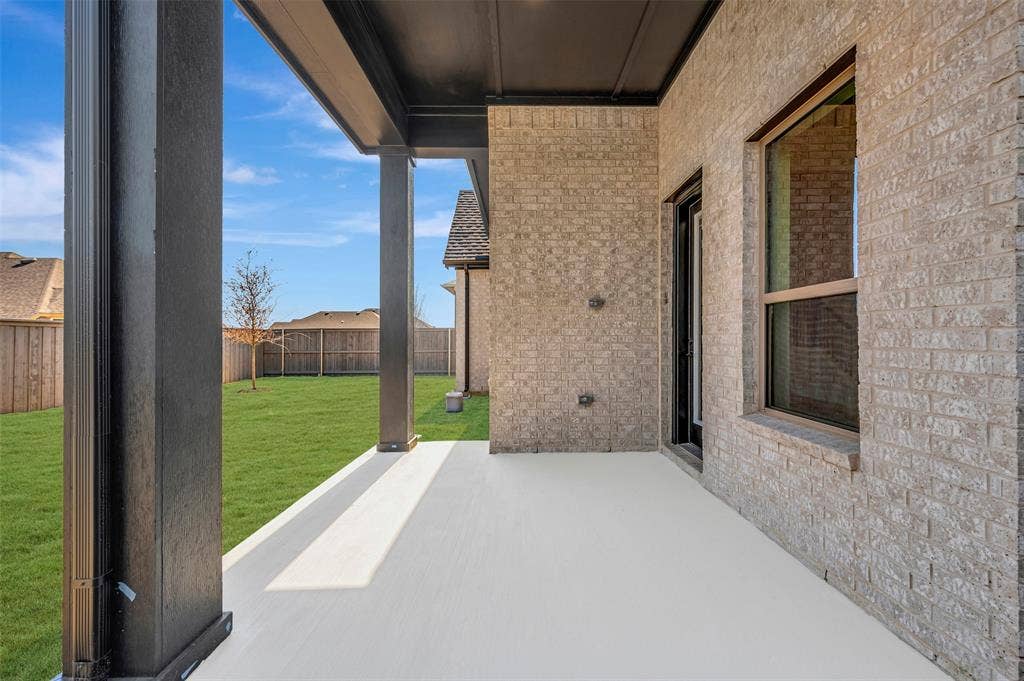 3752 Bermuda Grass Way, Grand Prairie, TX 76084 Fenced backyard with a patio area
