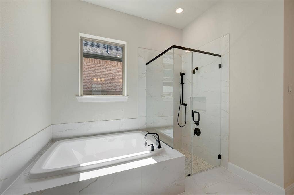 3752 Bermuda Grass Way, Grand Prairie, TX 76084 Full bath with a marble finish shower, a garden tub, and recessed lighting