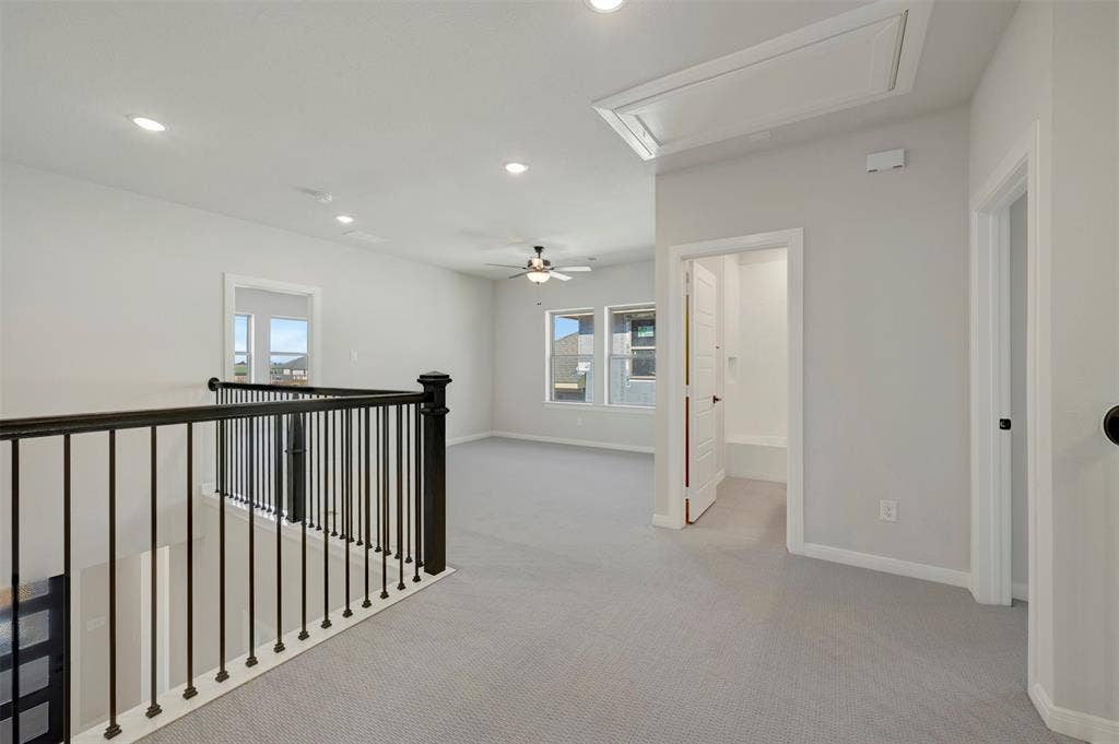 3752 Bermuda Grass Way, Grand Prairie, TX 76084 Hall featuring light carpet, recessed lighting, and an upstairs landing