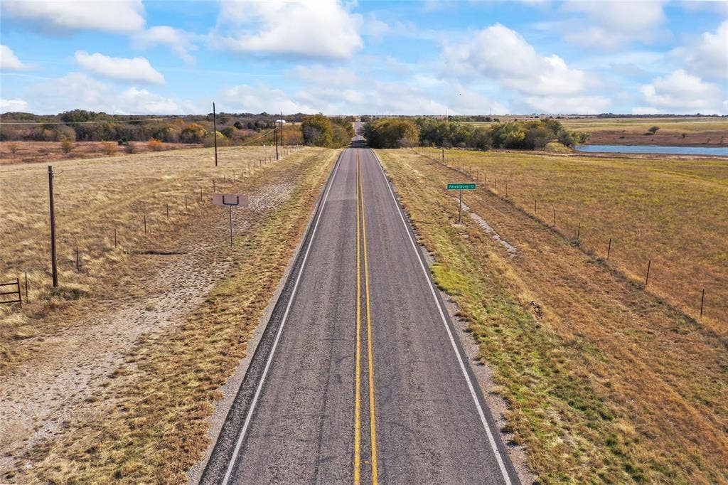 1315 Fm 677 S, Saint Jo, TX 76265 View of asphalt street with a view of rural / pastoral area