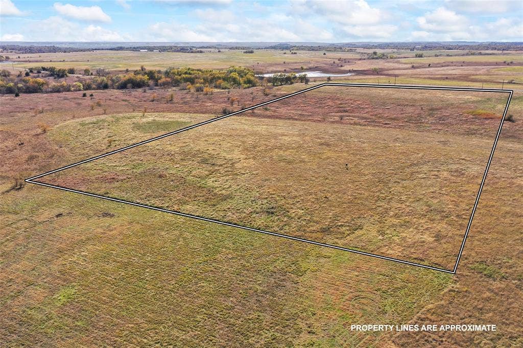1315 Fm 677 S, Saint Jo, TX 76265 Aerial view of sparsely populated area featuring property boundaries highlighted
