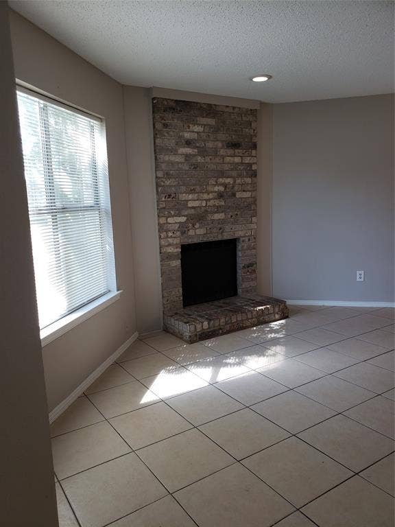 808-810 Red Bud Drive, DeSoto, TX 75115 808 - Front window and hearth from entry. (For rentals, the fireplace is covered; simple to uncover.)