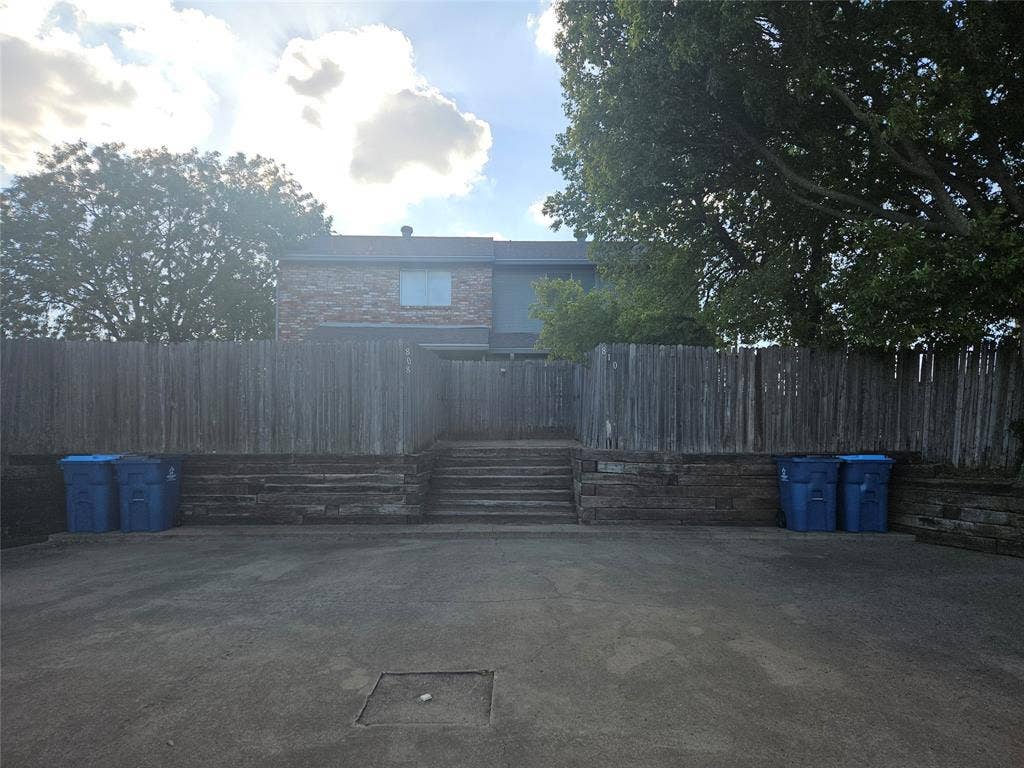 808-810 Red Bud Drive, DeSoto, TX 75115 808-810 Red Bud - back alley parking and garbage pickup. 808 is on the left, 810 is on the right.