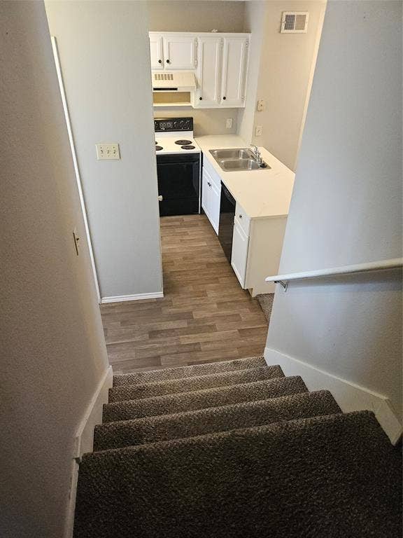 808-810 Red Bud Drive, DeSoto, TX 75115 810 - View of kitchen from stair landing.