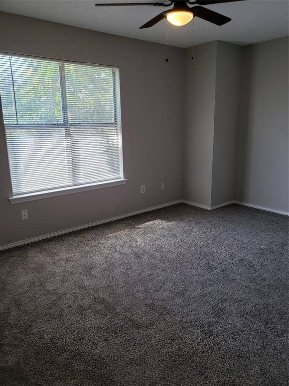 808-810 Red Bud Drive, DeSoto, TX 75115 808 - Bedroom with two closets and ceiling fan.