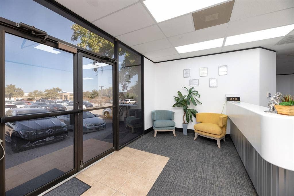 1610 Corporate Court, Irving, TX 75038 Community lobby featuring a drop ceiling and a wall of windows