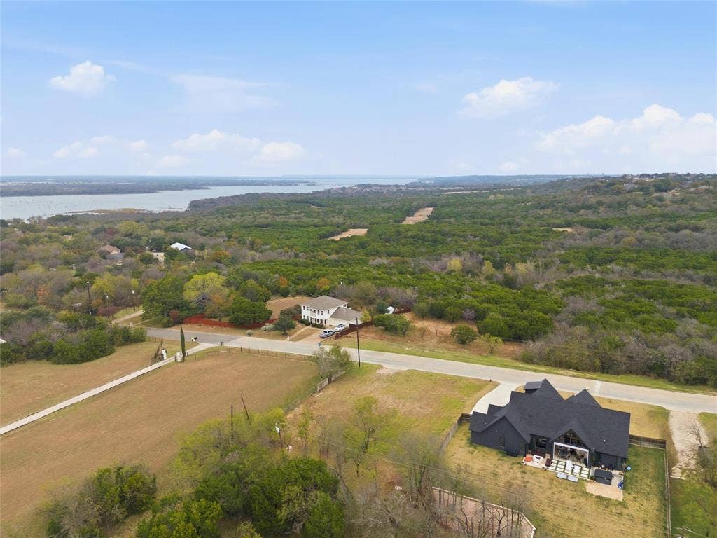 13854 Harbor Drive, Woodway, TX 76712 Bird's eye view of a large body of water and a forest