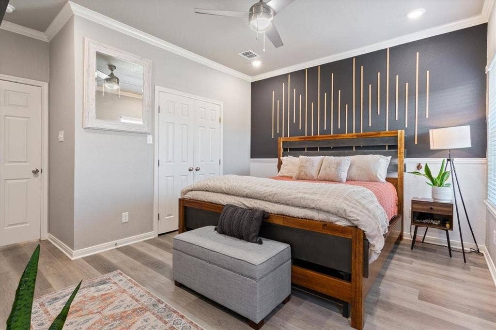 518 Alamo Court, McGregor, TX 76657 Bedroom with ornamental molding, light wood-type flooring, a ceiling fan, and recessed lighting