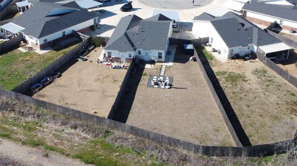 518 Alamo Court, McGregor, TX 76657 Aerial view of residential area