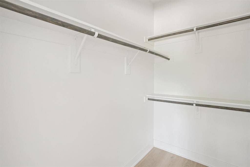 2524 Havenhurst Street, #102, Farmers Branch, TX 75234 Walk in closet featuring light wood-style floors