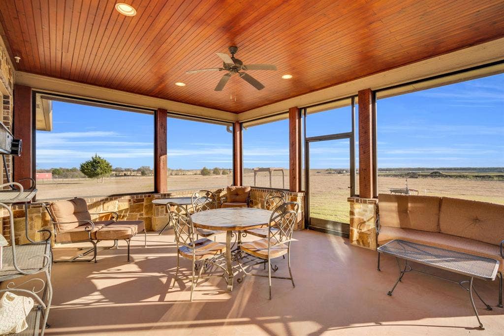 217 Hunter Pass, Waxahachie, TX 75165 Sunroom / solarium featuring finished concrete flooring, recessed lighting, and wood ceiling