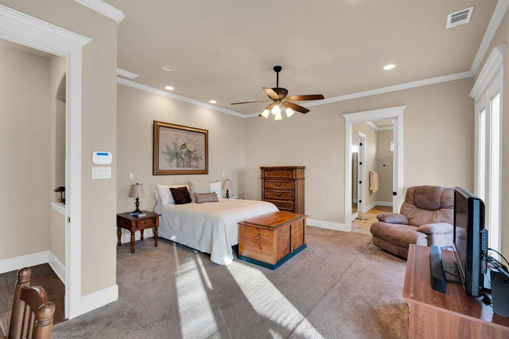217 Hunter Pass, Waxahachie, TX 75165 Bedroom featuring recessed lighting, ornamental molding, carpet floors, and a ceiling fan