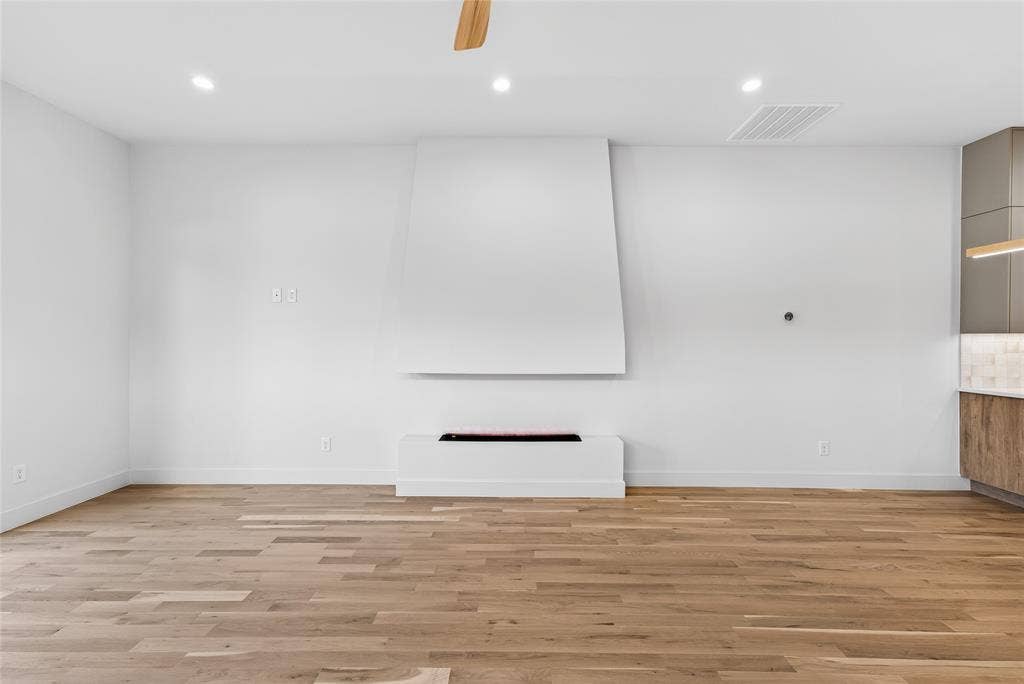 6603 Roper Street, Dallas, TX 75209 Water vapor fireplace offers ambiance and is non-toxic and eco-friendly.