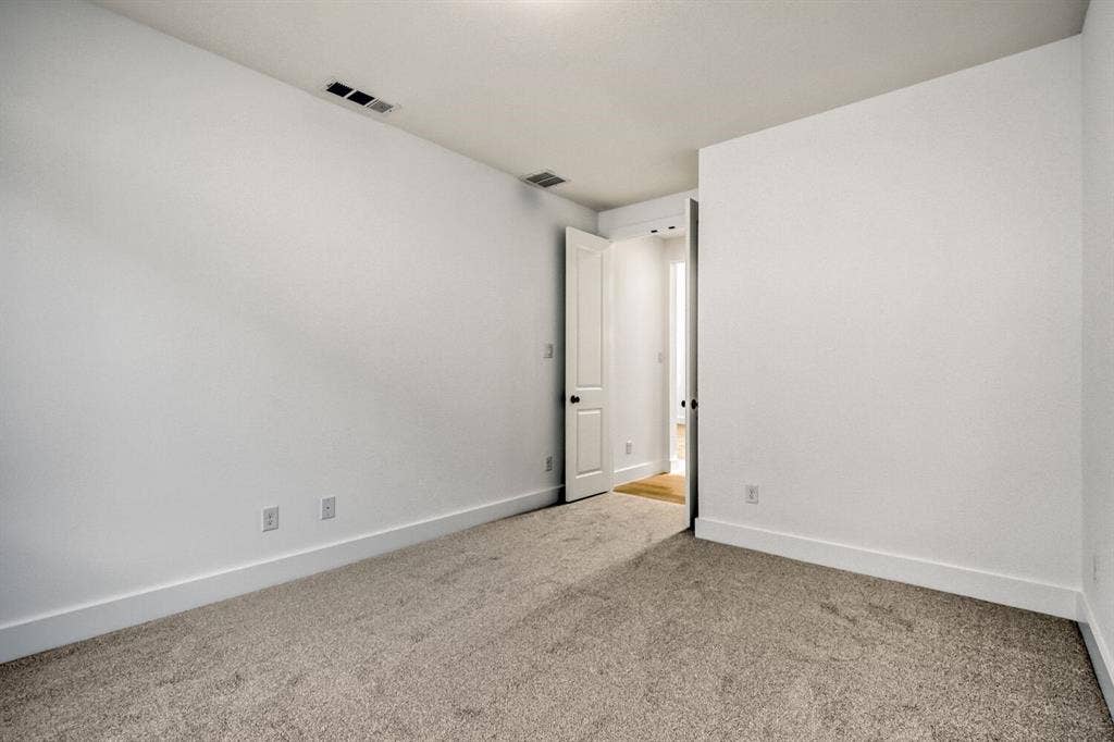 2228 Prickly Cactus Drive, Forney, TX 75126 Unfurnished room with carpet floors and baseboards