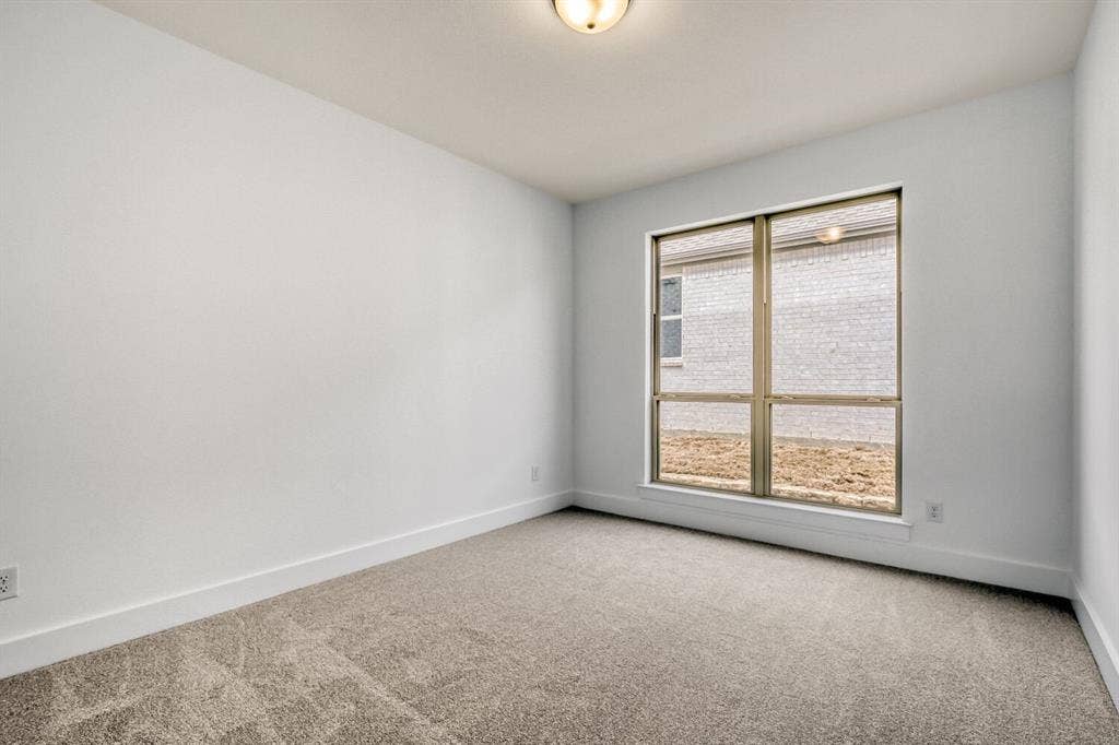 2228 Prickly Cactus Drive, Forney, TX 75126 Unfurnished room with carpet flooring and baseboards