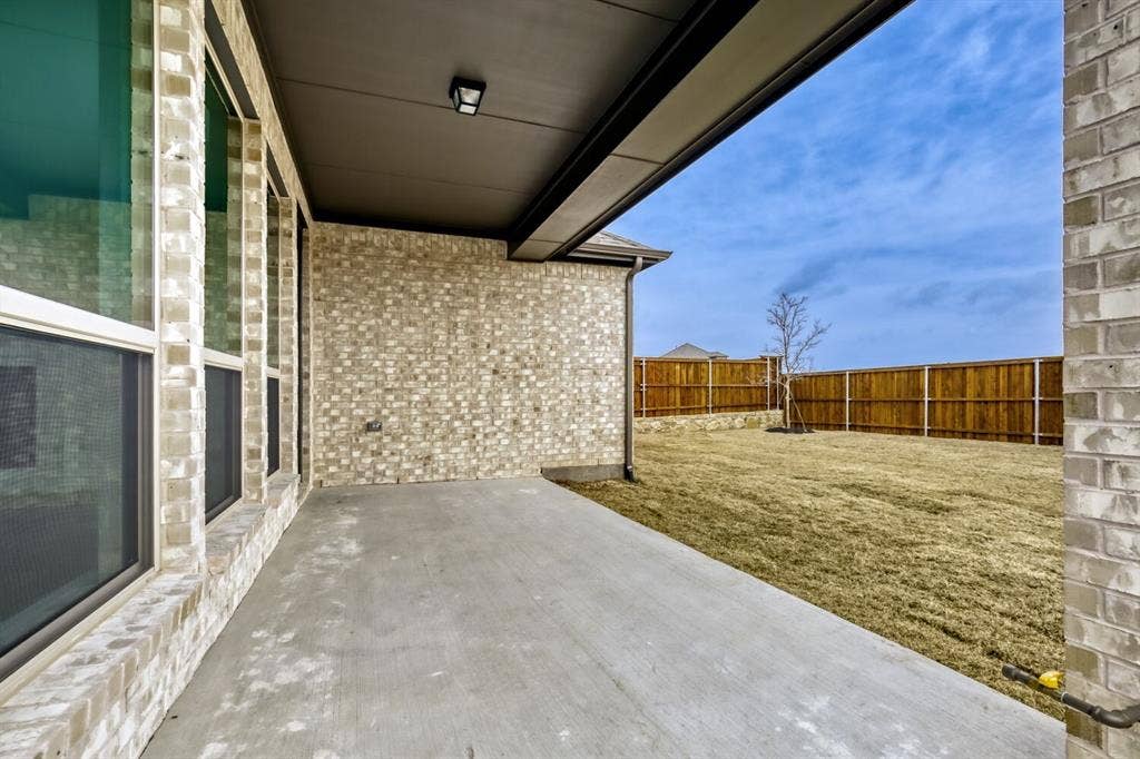 2228 Prickly Cactus Drive, Forney, TX 75126 Fenced backyard with a patio area